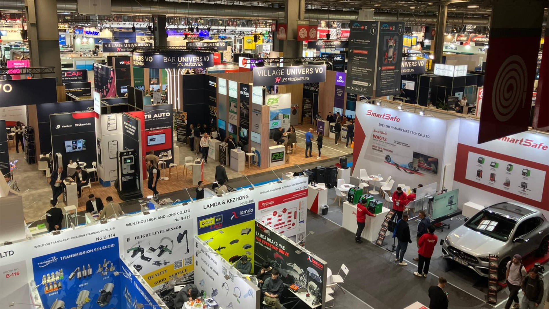 Aerial view of the Equip Auto Paris 2025 exhibition hall with international exhibitors and automotive industry booths.