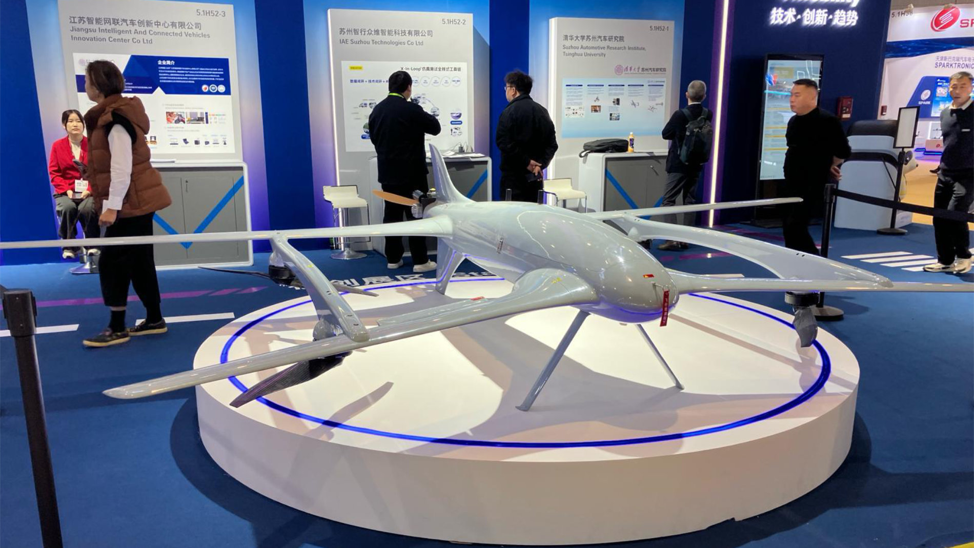 Futuristic large drone displayed on podium
