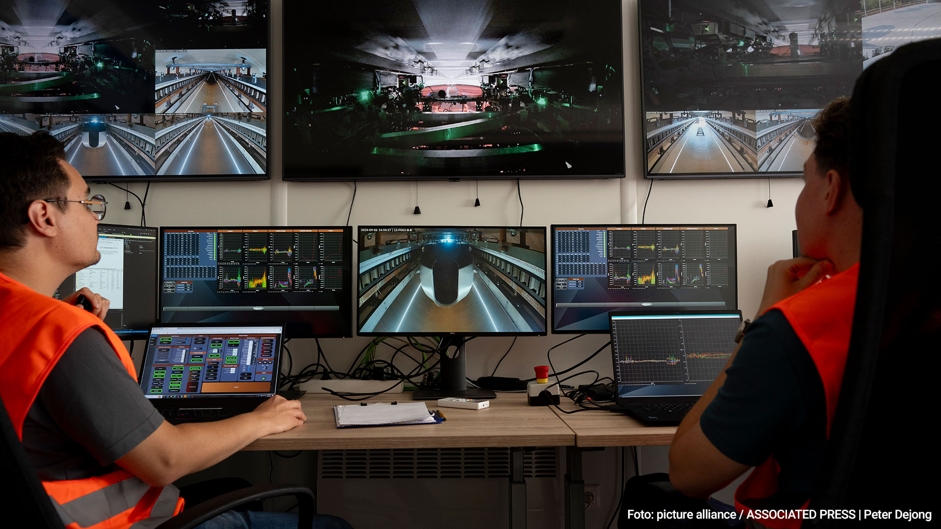 Two people in the control room