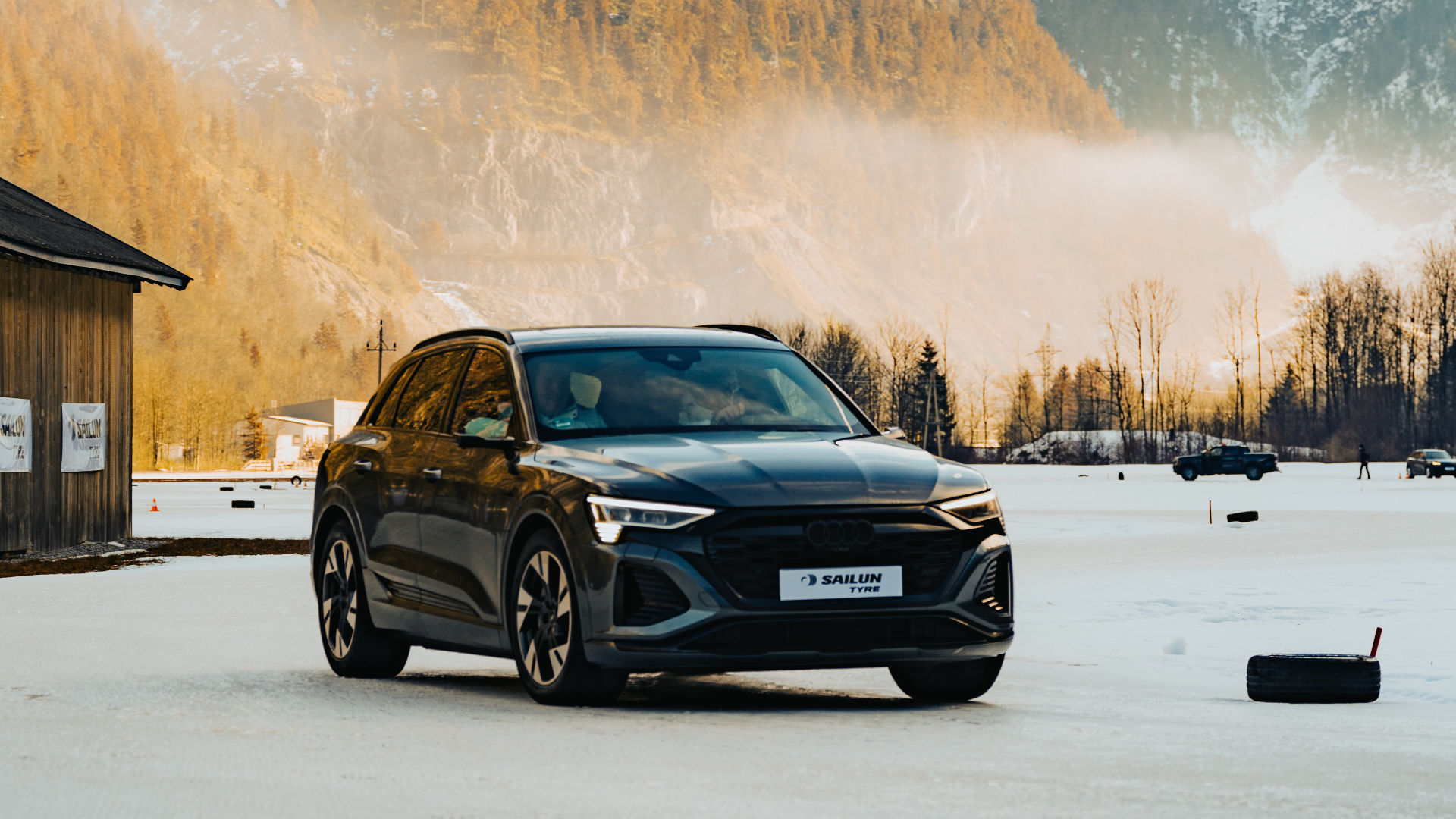 Car with Sailun tiers infront of a mountain