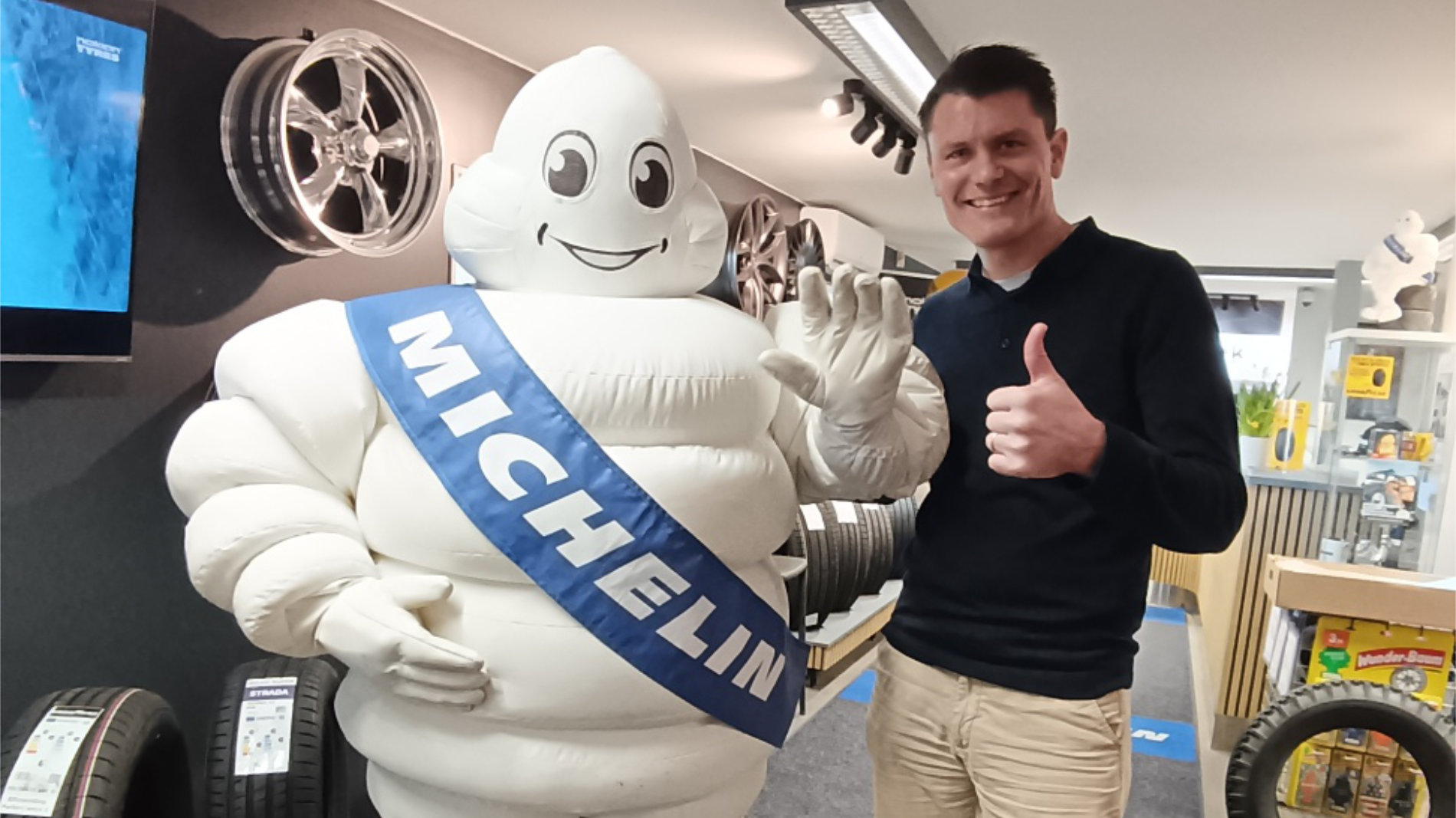 Rutger Veerman poses with Michelin mascot