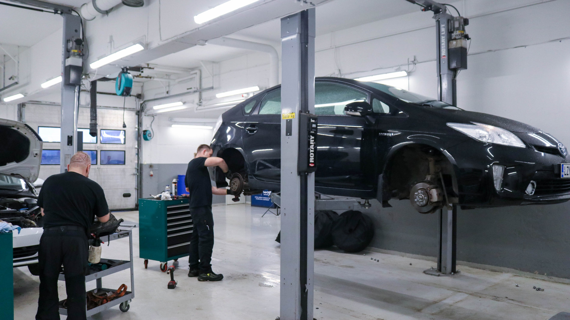 Car on lift during vehicle service