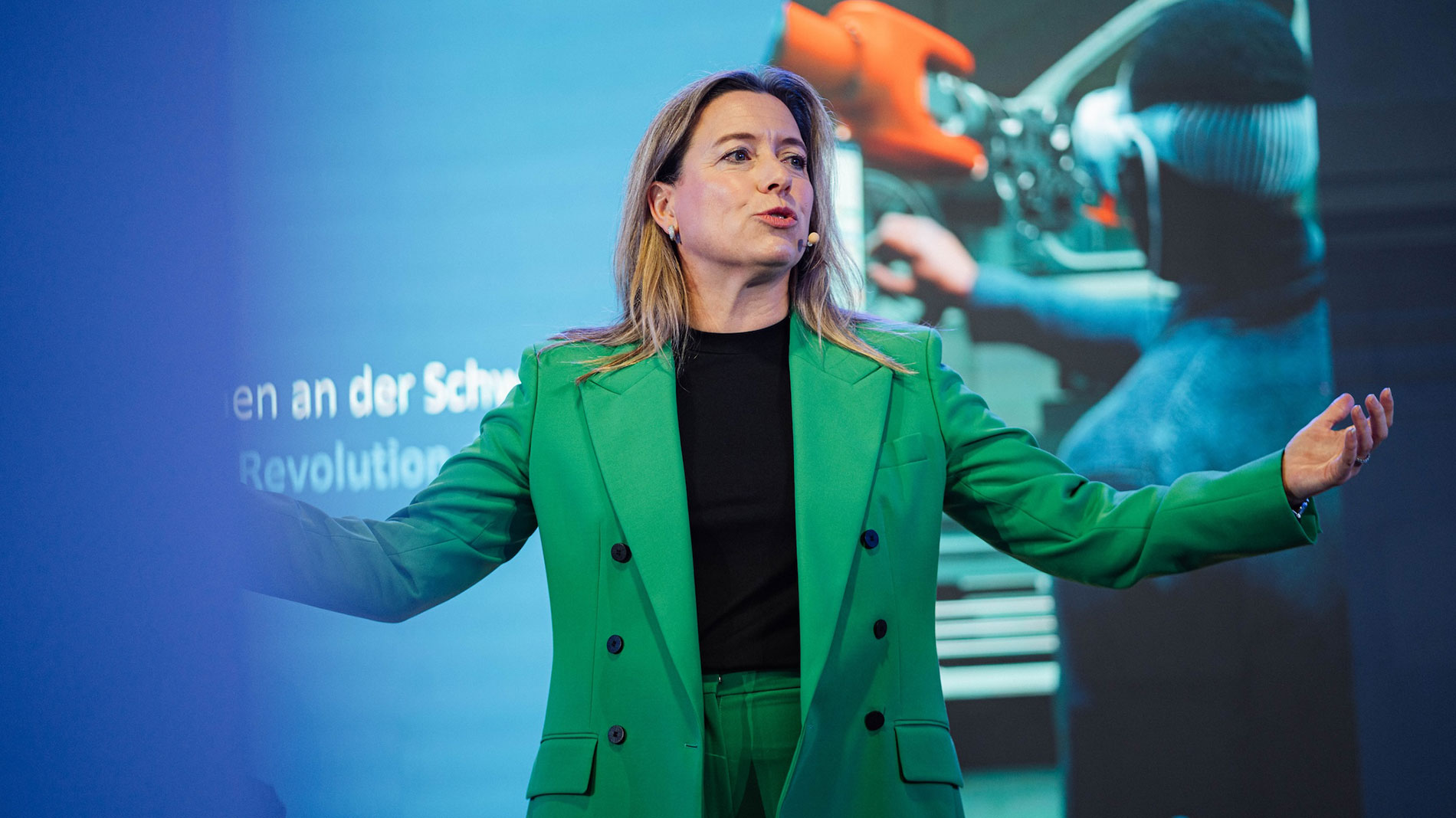 Sabine Scheunert is giving a talk on stage